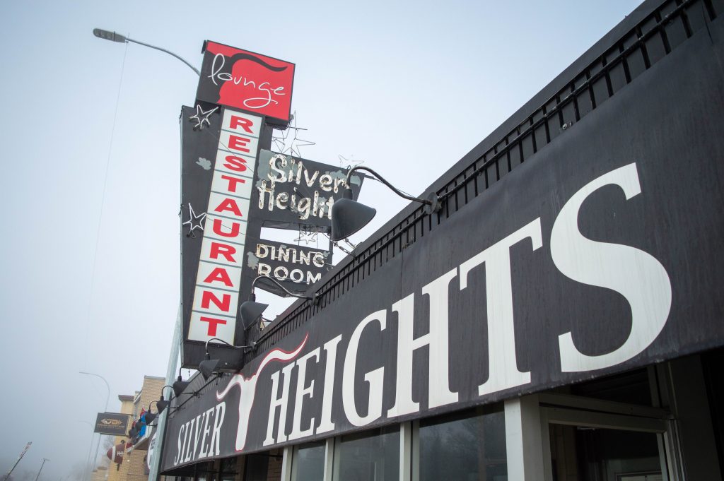 Outside of Silver Heights Restaurant & The Heights Lounge on a cloudy day. 